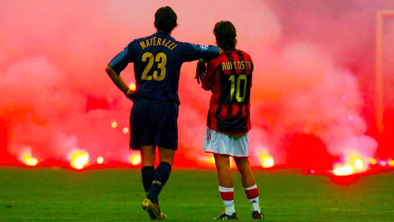 Materazzi e Rui Costa in un derby di qualche anno fa