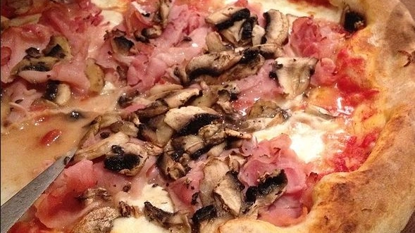 Pizza prosciutto e  funghi, la preferita nel Nord Italia
