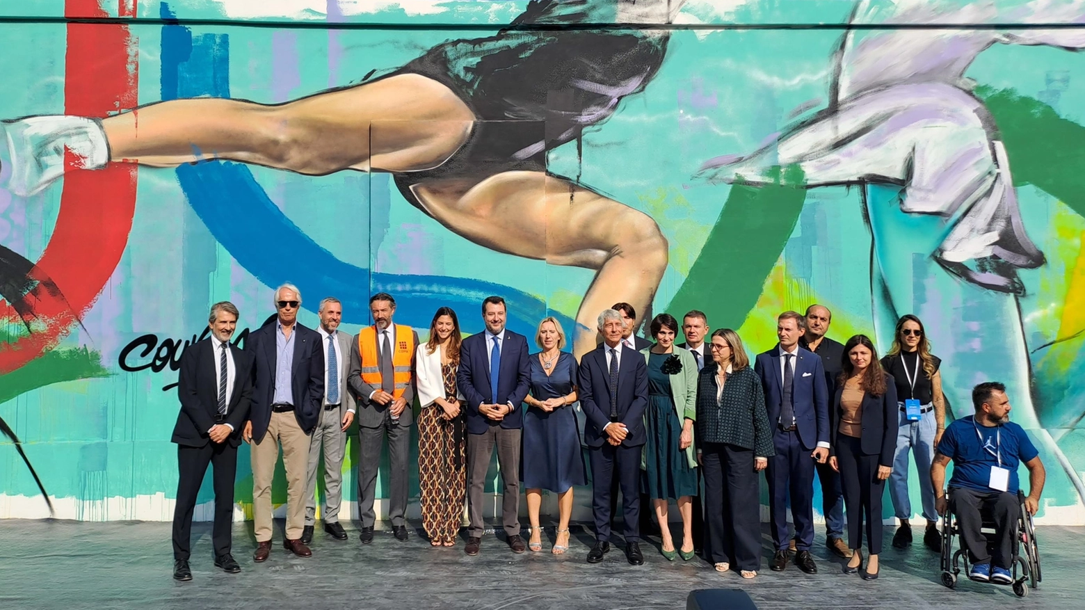 La presentazione di Scalo d'Arts, sui muri perimetrali del Villaggio Olimpico