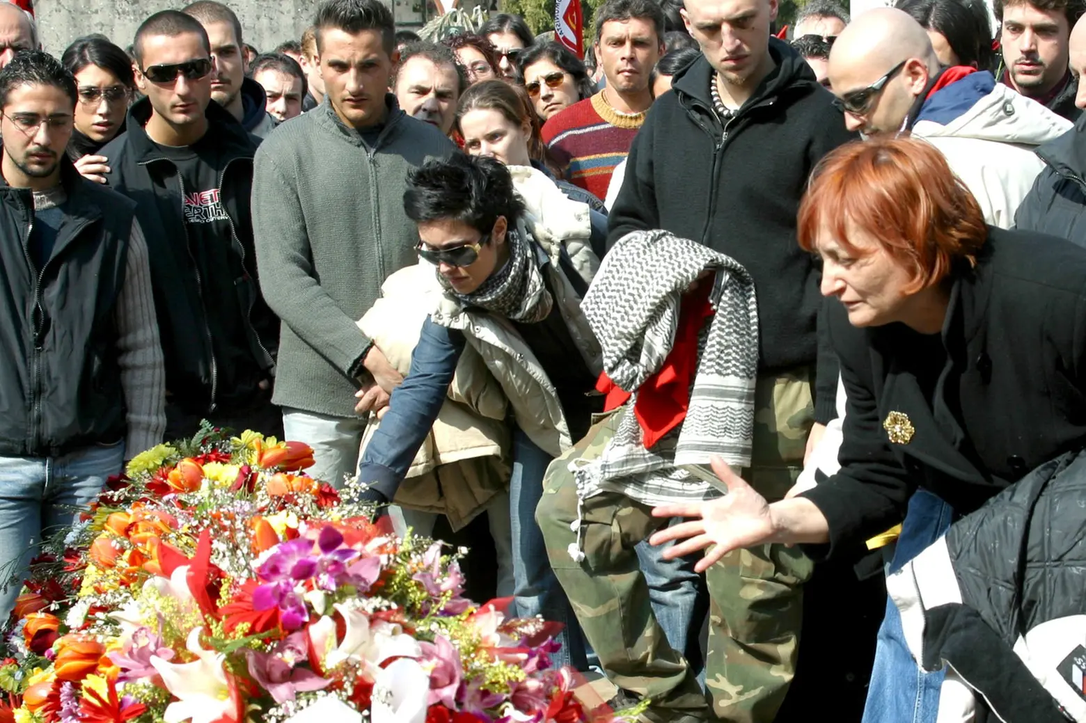 The funeral of David Caesar.  On the right, Dax's mother, Rosa Piro