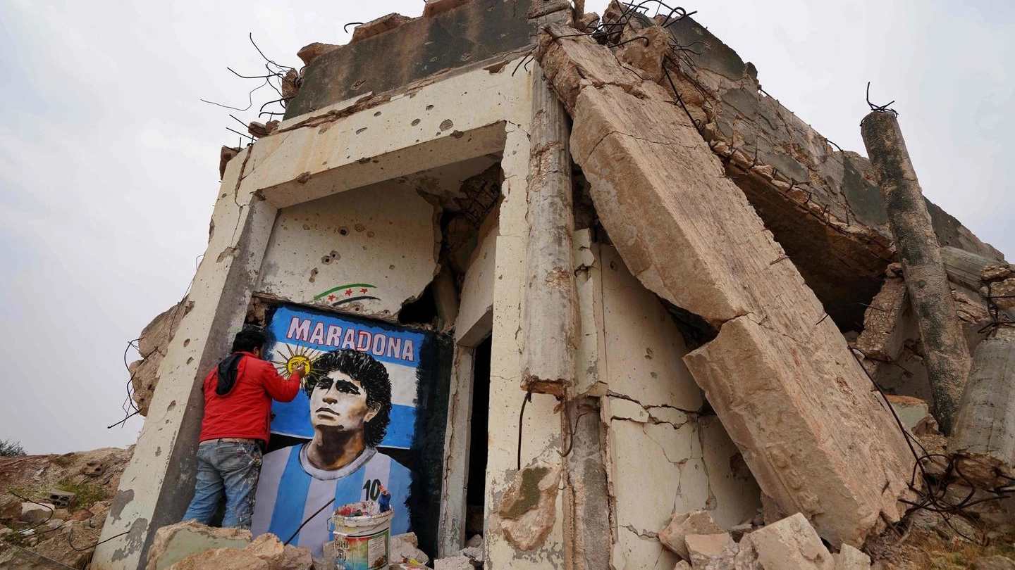 Il murales di Maradona in Siria (Ansa)