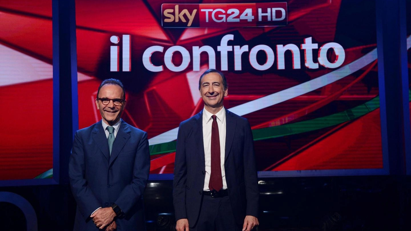 I due sfidanti al ballottaggio Stefano Parisi e Giuseppe Sala negli studi televisivi di Sky