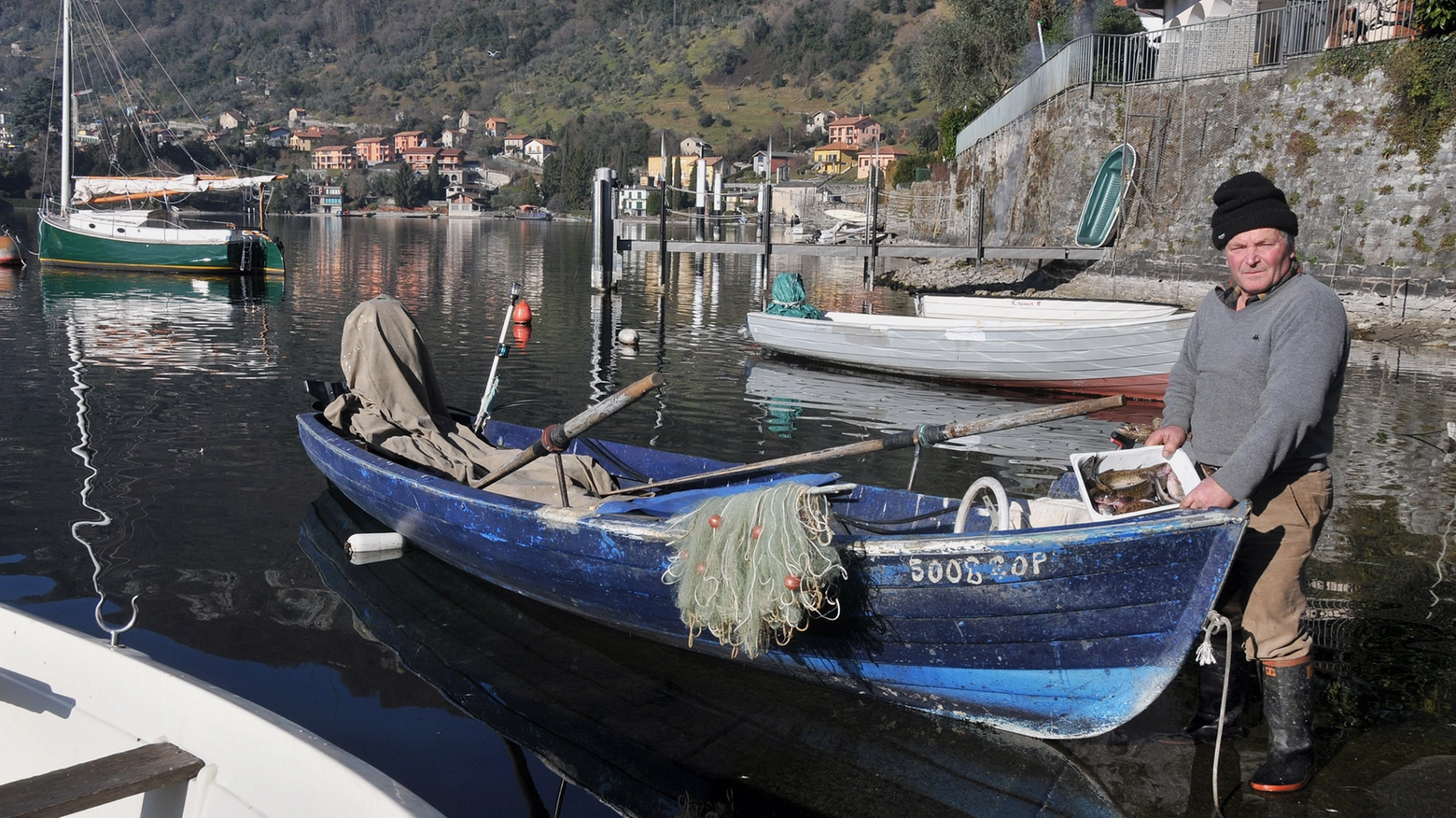 Pescatore sul lago di Como