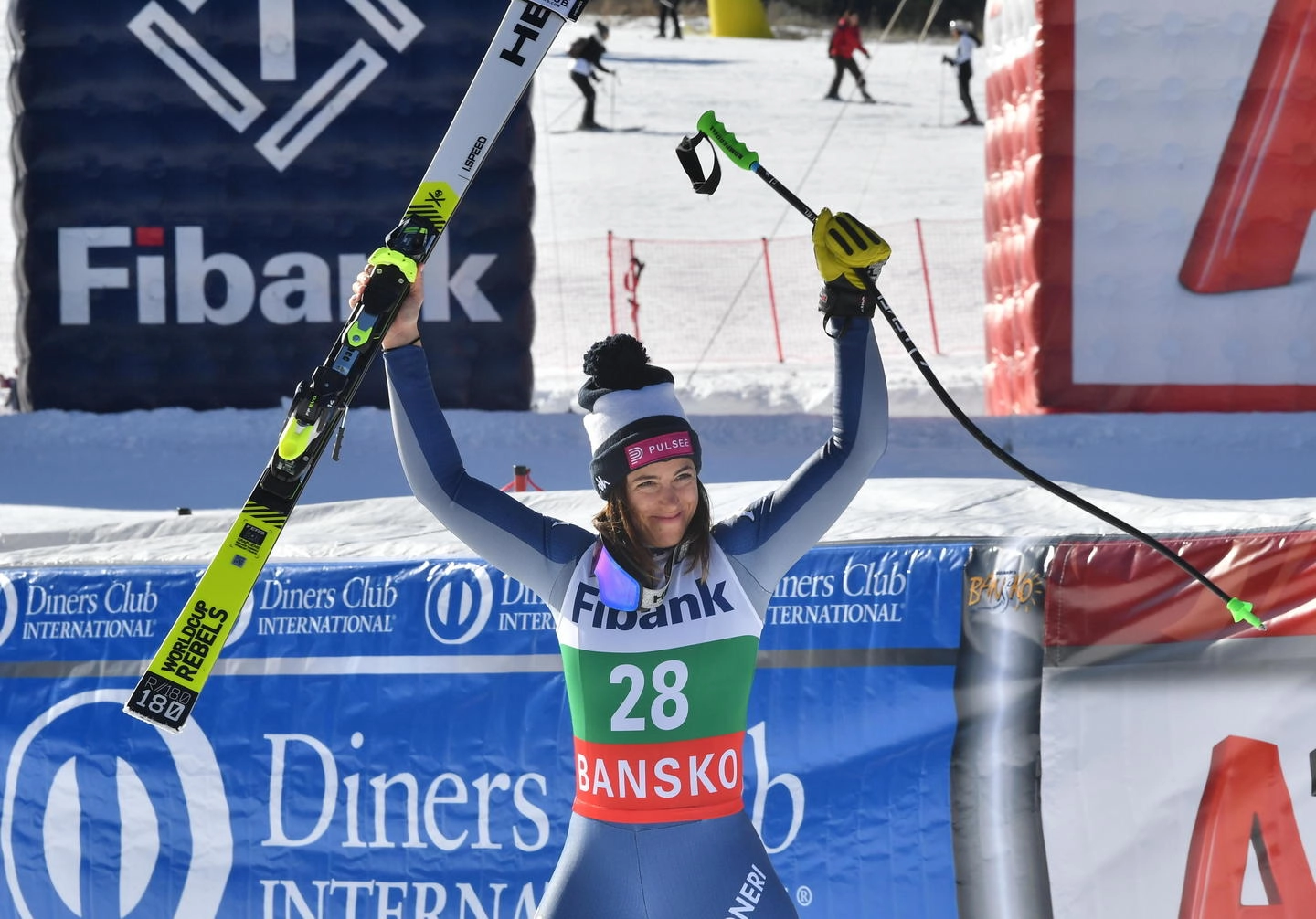 epa08162617 Winner Elena Curtoni of Italy celebrates after winning the Women's Downhill race at the FIS Alpine Skiing World Cup in Bansko, Bulgaria on 25 January 2020.  EPA/GEORGI LICOVSKI