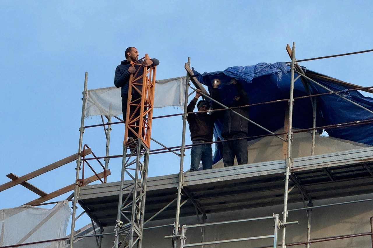 Gli operai nel corso della protesta (Mdf)