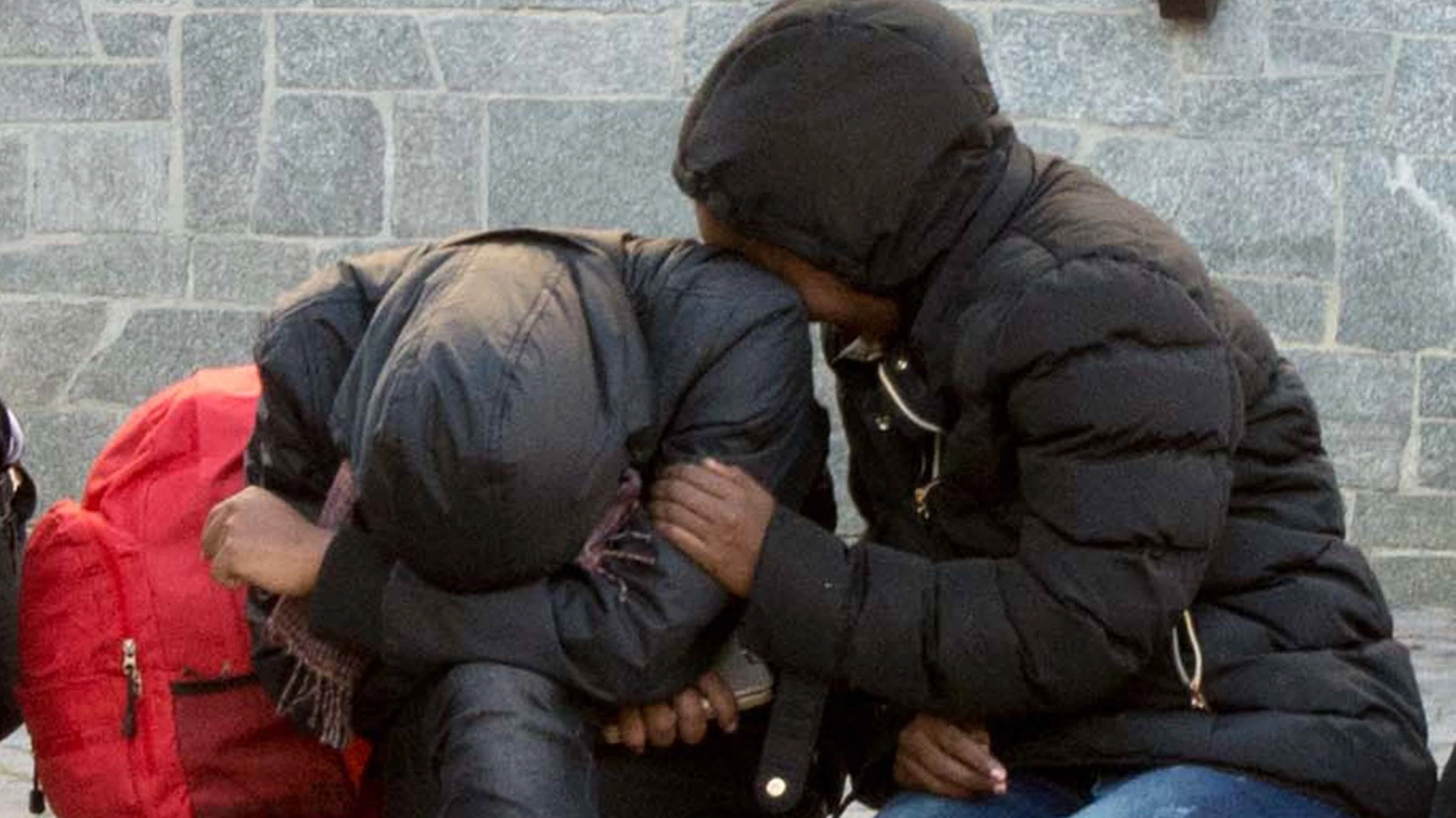 I migranti in stazione a Tirano (National Press)