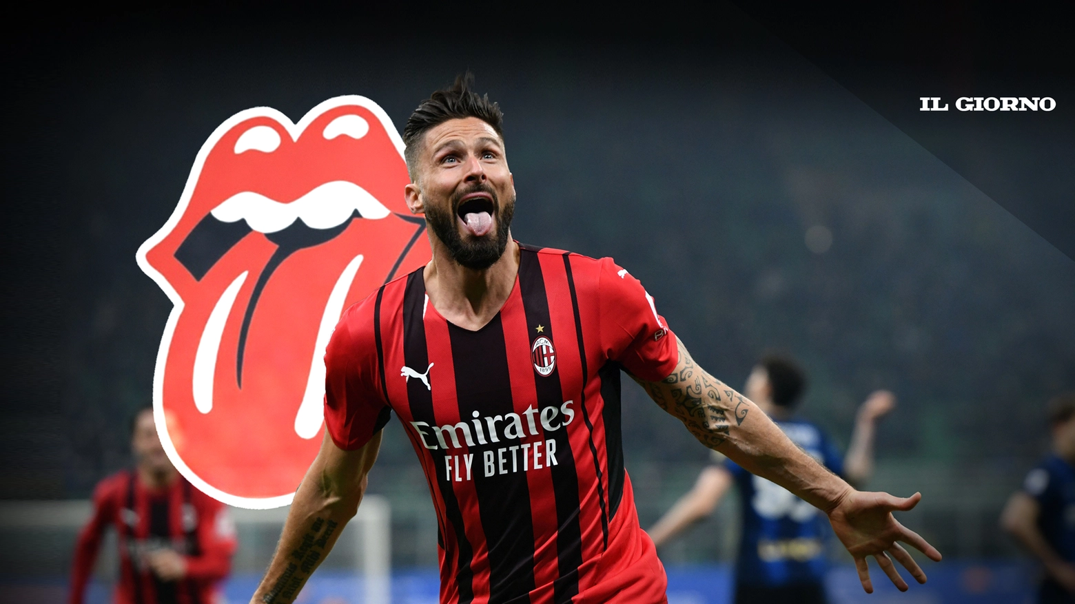 Olivier Giroud: linguaccia dopo il gol nel derby. Dietro, il logo degli Stones