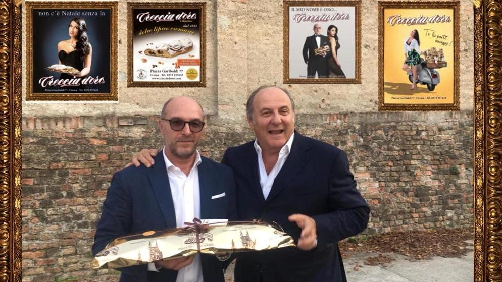 Il pasticcere Giampiero Maccalli con Gerry Scotti e la Treccia d'Oro