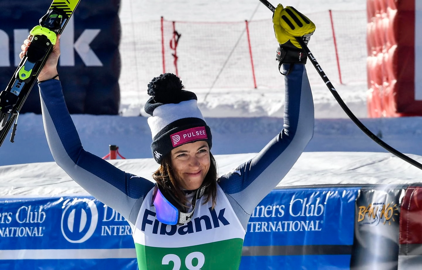 epa08162734 Winner Elena Curtoni of Italy celebrates after winning the Women's Downhill race at the FIS Alpine Skiing World Cup in Bansko, Bulgaria on 25 January 2020.  EPA/GEORGI LICOVSKI