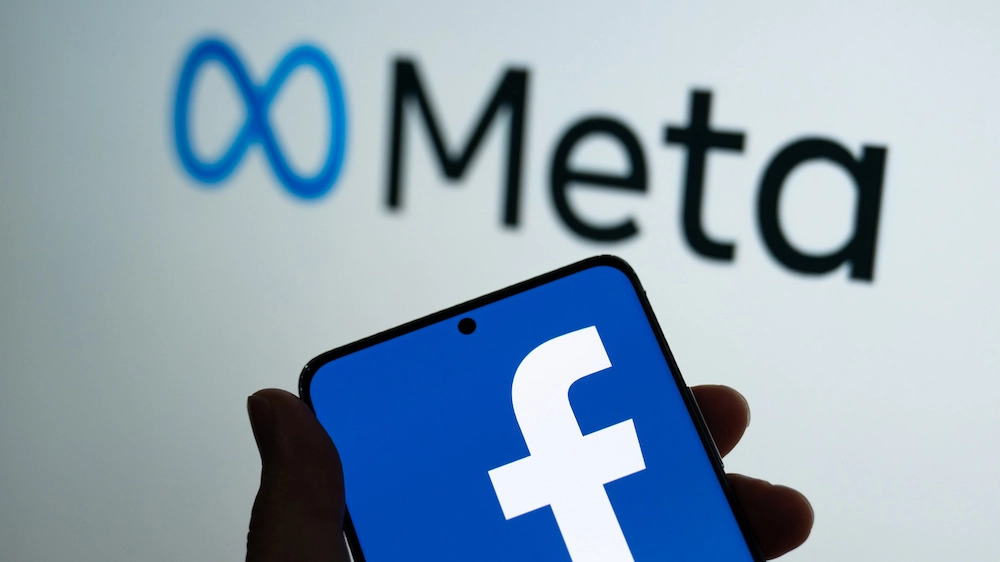 I loghi di Facebook e della holding Meta