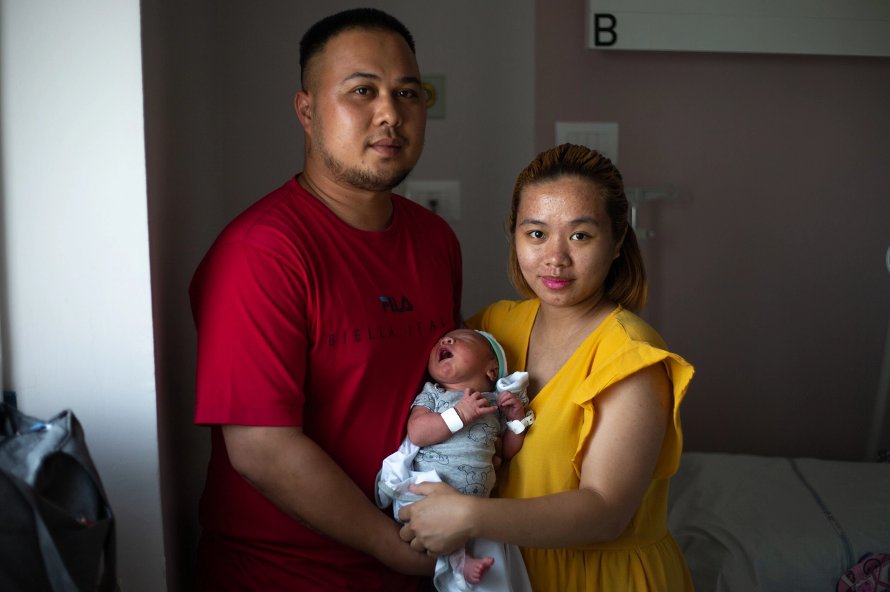 Papà Kenneth Abad e mamma Princess Geline Navarro con Kyhaelle Evoanne (foto Davide Canella)
