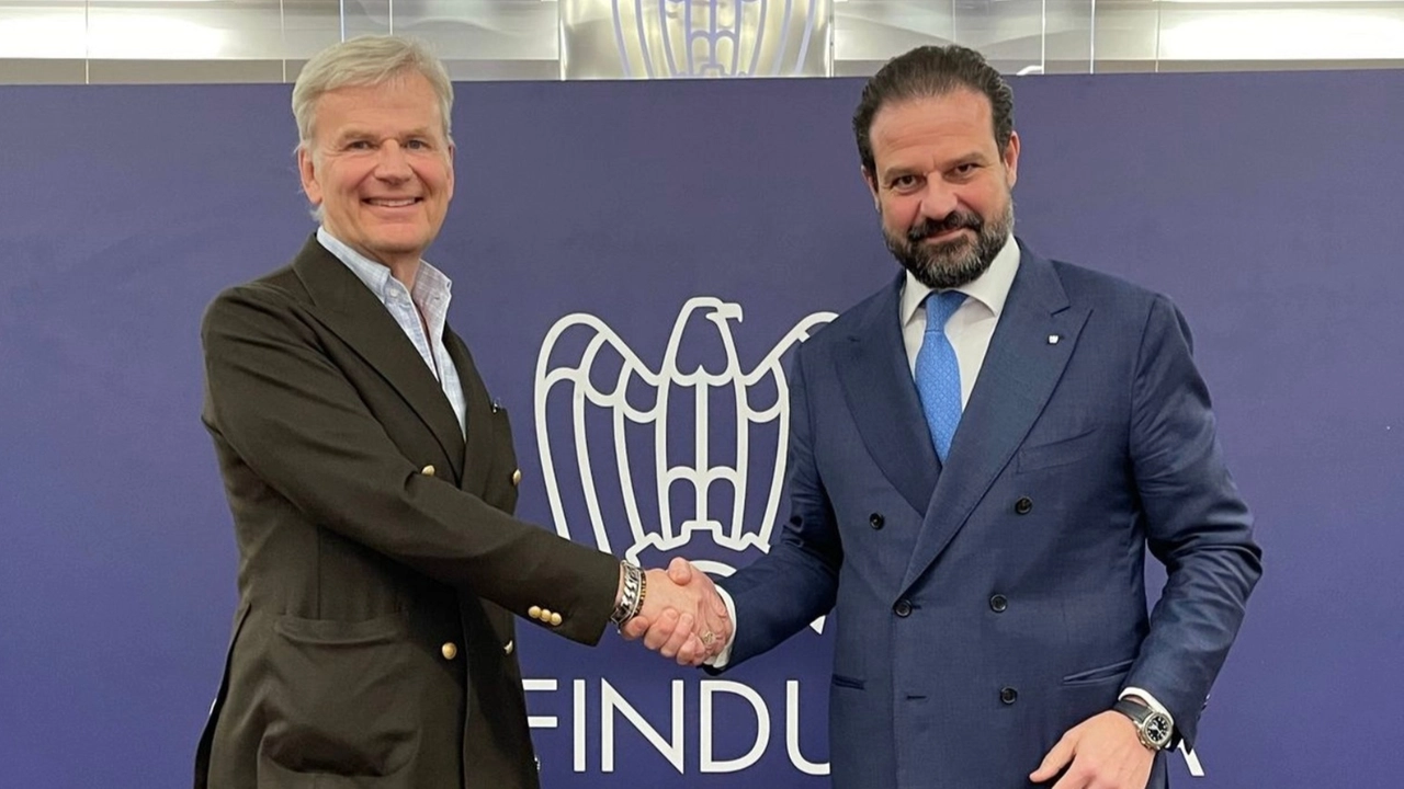 A entrega: da esquerda para a direita: Franco Gussalli Beretta e Paolo Streparava
