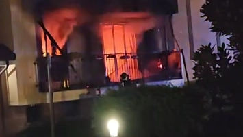 Incendio in un appartamento a Locate Triulzi (Frame da un video del Tgr Lombardia)