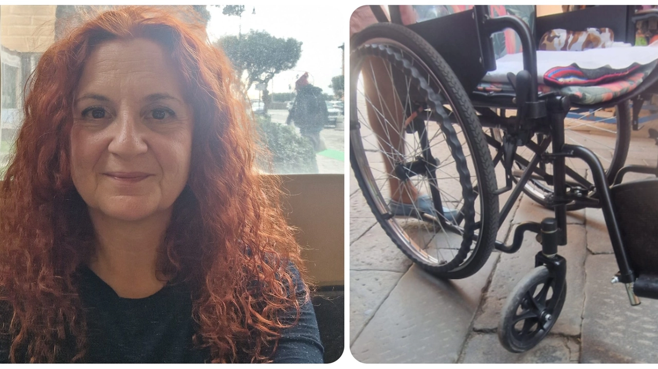 Giorgia Leone e la carrozzella rimasta incastrata in strada