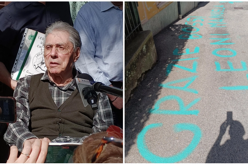 Umberto Bossi; a destra, la scritta di ringraziamento apparsa a Gemonio