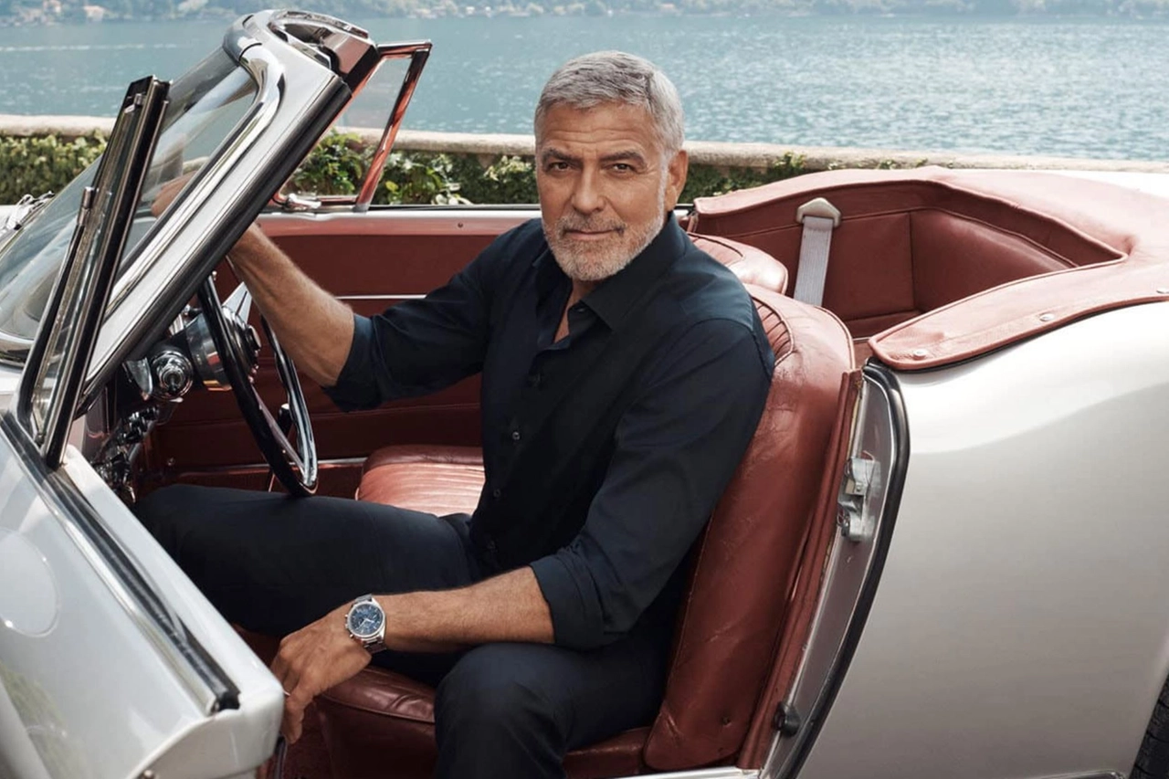 George Clooney driving on Lake Como, where he owns Villa Oleandra