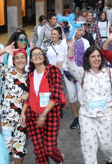 Podisti e runner senza la tuta. Pronti al via della Pigiama Run Podisti e runner senza la tuta. Pronti al via della Pigiama Run