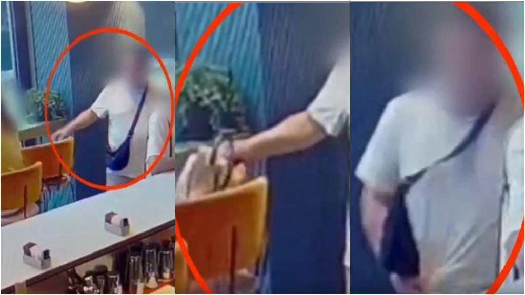 Milano, la sequenza del furto di una borsa in un bar (frame video polizia)
