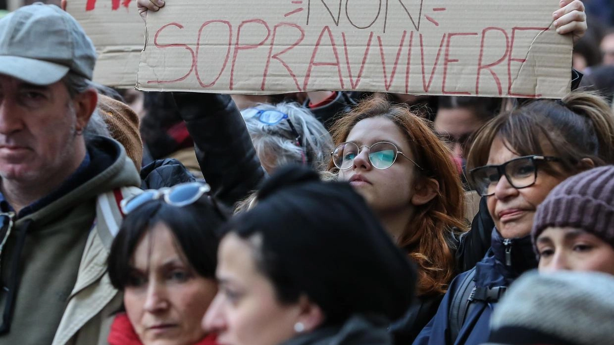 Cartello a una manifestazione contro la violenza sulle donne