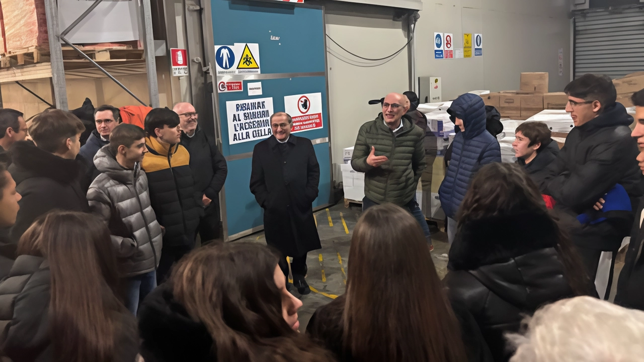 L'Arcivescovo Delpini e adolescenti scoprono il Banco Alimentare, promuovendo solidarietà e attenzione alle nuove povertà. L'Arcivescovo Delpini e adolescenti scoprono il Banco Alimentare, promuovendo solidarietà e attenzione alle nuove povertà.