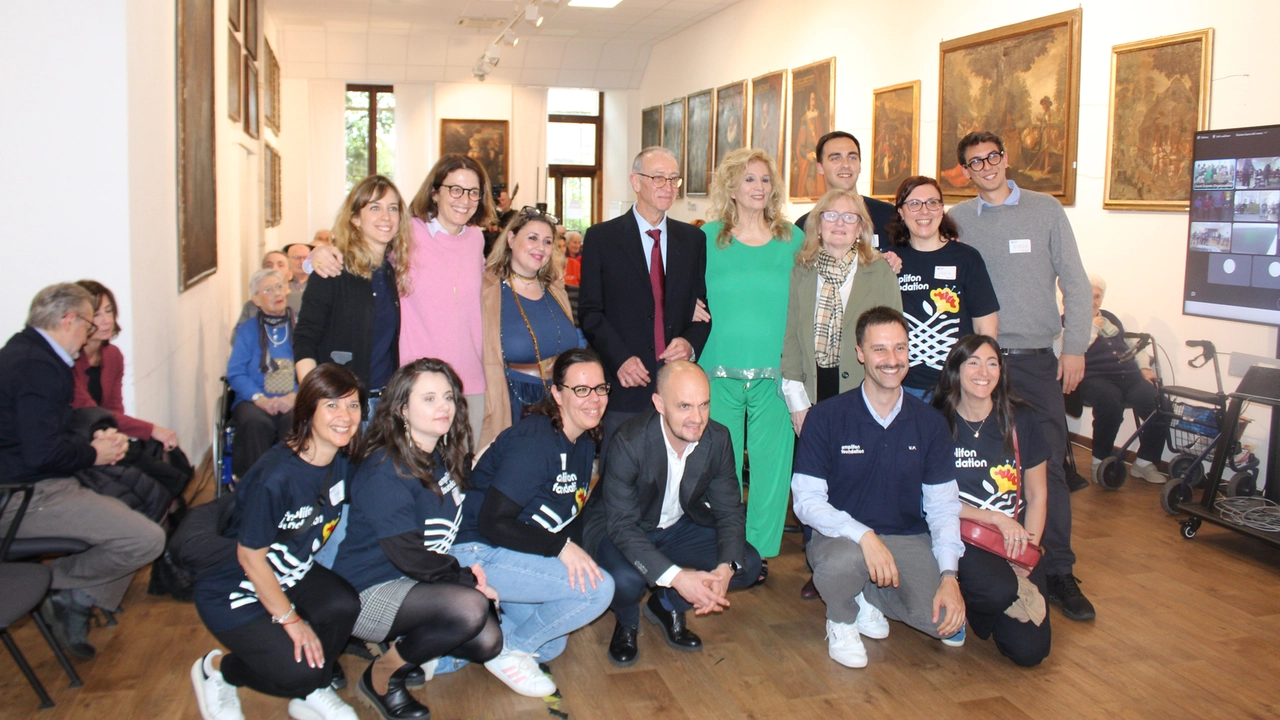 Iva Zanicchi insieme con gli organizzatori dell’iniziativa e i volontari
