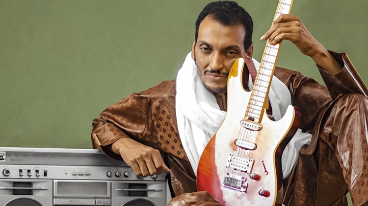 Il teatro Borsoni di Brescia ospita il concerto di Bombino, stella del desert blues nigeriano. Accompagnato da talentuosi musicisti, il suo sound ribelle e coinvolgente promette un'esperienza unica. Il teatro Borsoni di Brescia ospita il concerto di Bombino, stella del desert blues nigeriano. Accompagnato da talentuosi musicisti, il suo sound ribelle e coinvolgente promette un'esperienza unica.