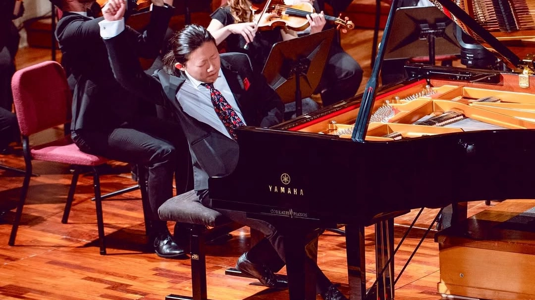 Il talentuoso pianista cinese durante una delle sue numerose esibizioni Il talentuoso pianista cinese durante una delle sue numerose esibizioni