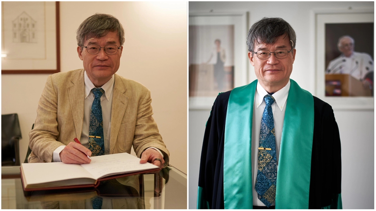 Hiroshi Amano, immortalato nel corso della sua visita alla Bicocca: mentre firma il libro d'onore e con la stola della laurea honoris causa