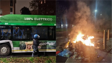 Guerriglia nella notte al Corvetto: autobus 93 devastato e roghi in strada. Sulla fiancata del bus distrutto una scritta per Ramy Elgaml