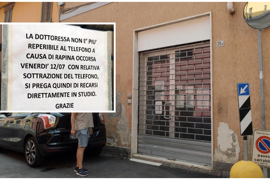L'esterno dello studio medico e il dettaglio del cartello affisso dopo la rapina