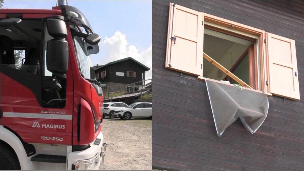 A sinistra un camion dei pompieri, a destra una finestra spalancata dopo l'esplosione nel rifugio in Valtellina A sinistra un camion dei pompieri, a destra una finestra spalancata dopo l'esplosione nel rifugio in Valtellina