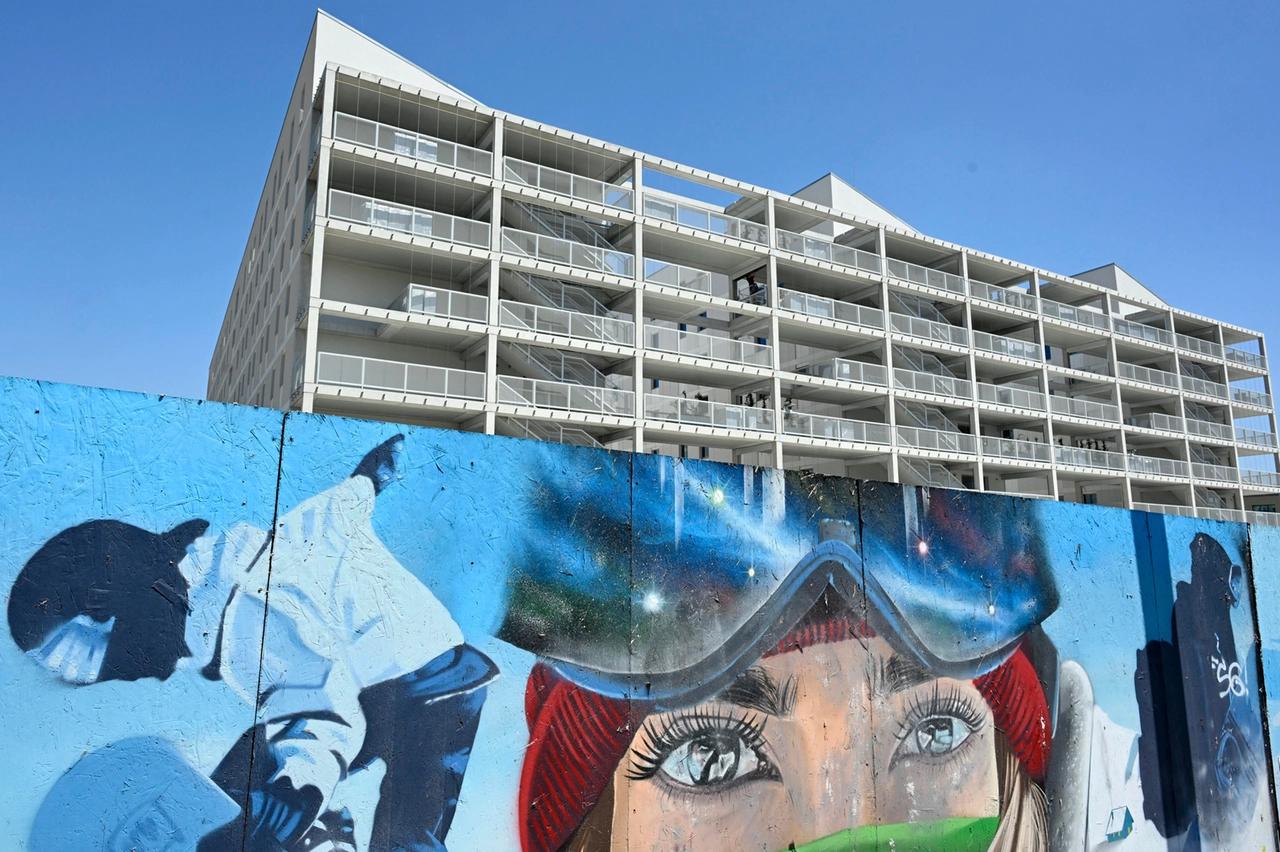 Il cantiere del Villaggio Olimpico. Una volta ultimato, ospiterà 1.400 atleti e al termine delle Olimpiadi invernali sarà convertito in studentato