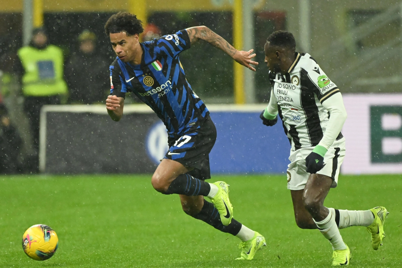 Trevor Buchanan dell'Inter e il difensore dell'Udinese Hassane Kamara