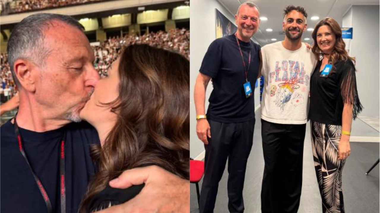 Amadeus e Giovanna Civitillo romantici a San Siro: selfie e baci al concerto di Marco Mengoni