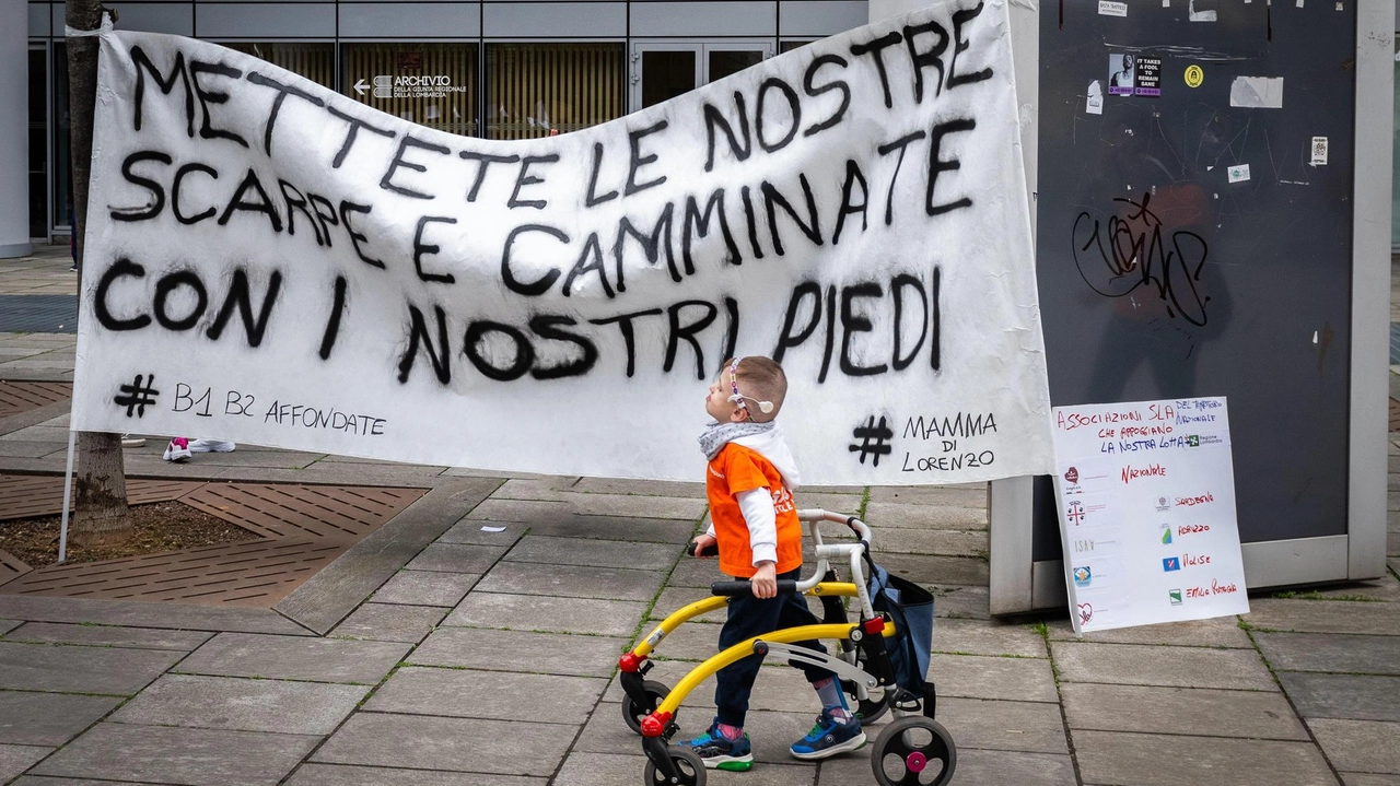 Dalla Regione 11 milioni di euro dopo le proteste in piazza e un ricorso al Tar delle famiglie. Ma da gennaio l’assistenza domiciliare tornerà in discussione. E il Comitato B1-B2 non ci sta. Dalla Regione 11 milioni di euro dopo le proteste in piazza e un ricorso al Tar delle famiglie. Ma da gennaio l’assistenza domiciliare tornerà in discussione. E il Comitato B1-B2 non ci sta.