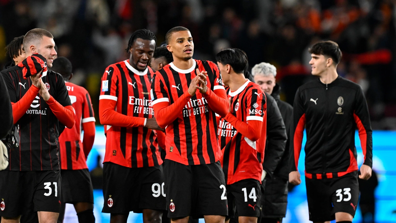 I giocatori del Milan celebrano la vittoria nella Supercoppa Italiana contro la Juventus I giocatori del Milan celebrano la vittoria nella Supercoppa Italiana contro la Juventus