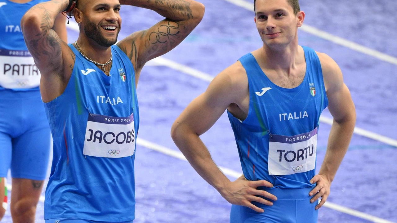 Marcell Jacobs e Filippo Tortu durante la staffetta 4X100 alle ultime Olimpiadi