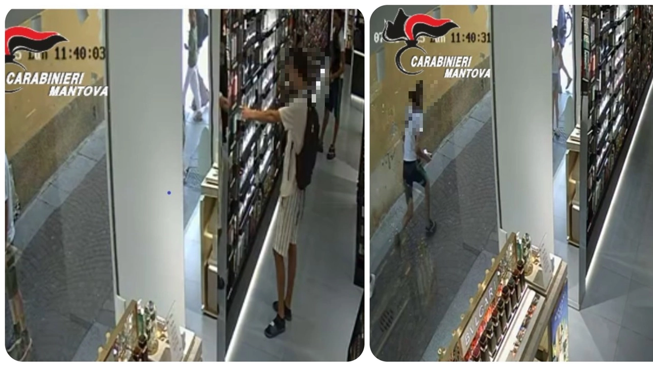 Il furto in profumeria: l'uomo arraffa profumi e scappa (Frame video carabinieri)