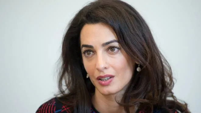 Human rights lawyer Amal Clooney speaking to a journalist at the state ministry in Stuttgart, Germany, 12 September 2016. Amal Clooney is campaigning for international awareness of the fate of the Yezidis, who are being persecuted by the IS terrorist group in Iraq.  PHOTO: BERND WEISSBROD/DPA