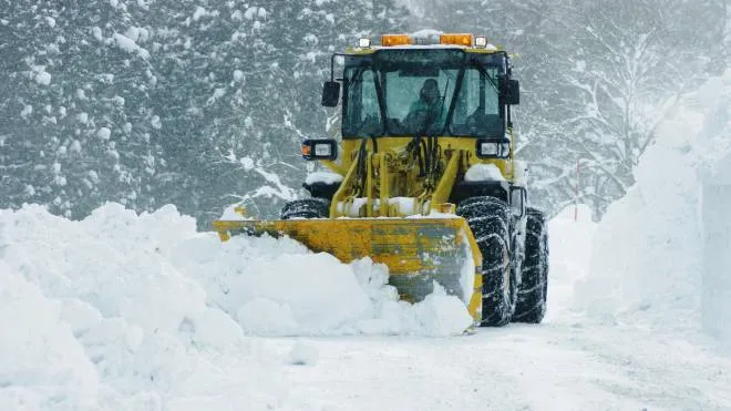 big bulldozer removing snow SPAZZANEVE NEVE
