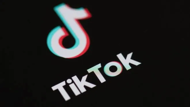 (FILES) In this file photo taken on May 27, 2020 (FILES) This file illustration photo taken on May 27, 2020 This illustration picture shows the logo of the social network  application Tik Tok on the screen of a phone. - President Donald Trump is days away from announcing strong action against the popular Chinese-owned video sharing app TikTok to protect US national security, Secretary of State Mike Pompeo said August 2, 2020. (Photo by Martin BUREAU / AFP)