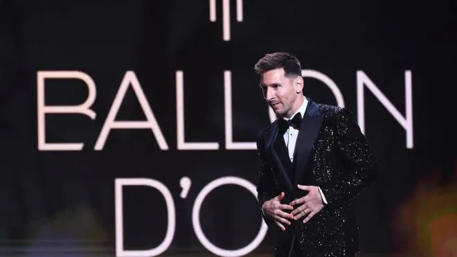 Paris Saint-Germain's Argentine forward Lionel Messi arrives to deliver a speech after being awarded the   Ballon d'Or award   during the 2021 Ballon d'Or France Football award ceremony at the Theatre du Chatelet in Paris on November 29, 2021. (Photo by FRANCK FIFE / AFP)