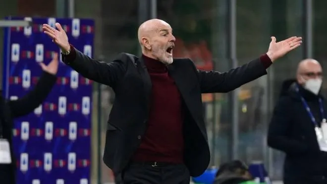 AC Milan's Italian head coach Stefano Pioli reacts during the Italian Serie A football match between AC Milan and Spezia on January 17, 2022 at the San Siro stadium in Milan. (Photo by MIGUEL MEDINA / AFP)
