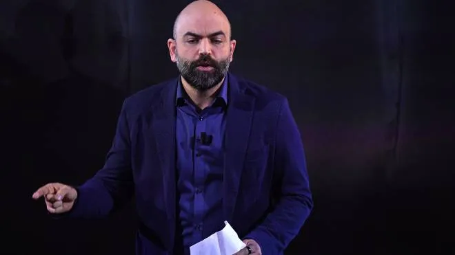 Italian writer Roberto Saviano performs on stage at the Ariston theatre during the 72nd Sanremo Italian Song Festival, in Sanremo, Italy, 03 February 2022. The music festival runs from 01 to 05 February 2022.   ANSA/ETTORE FERRARI