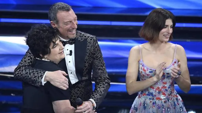 Sanremo Festival host and artistic director, Amadeus (C),  Italian actress Maria Chiara Giannetta (R) and the ''Guardiani di Blanca'' on stage at the Ariston theatre during the 72nd Sanremo Italian Song Festival, Sanremo, Italy, 04 February 2022. The music festival runs from 01 to 05 February 2022.  ANSA/RICCARDO ANTIMIANI
