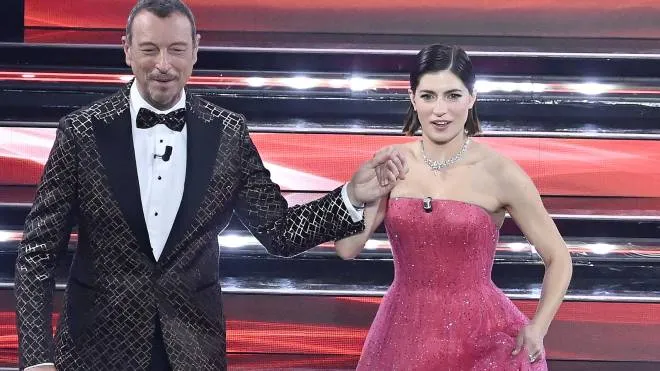 Sanremo Festival host and artistic director, Amadeus (L), and Italian actress Maria Chiara Giannetta  on stage at the Ariston theatre during the 72nd Sanremo Italian Song Festival, Sanremo, Italy, 04 February 2022. The music festival runs from 01 to 05 February 2022.  ANSA/RICCARDO ANTIMIANI