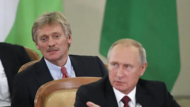 Russian President Vladimir Putin (front) and Kremlin spokesman Dmitry Peskov (back) attend a session of the Council of Heads of the Commonwealth of Independent States (CIS) in the Black sea resort of Sochi, Russia, 11 October 2017. CIS leaders meet in Sochi to discuss cooperation within the Commonwealth.  ANSA/MAXIM SHEMETOV / POOL