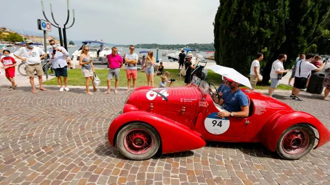 Vintage and historic cars of the �Mille Miglia' vintage car rally's, near Sal� (Brescia), Italy, 19 June 2021. The classic Mille Miglia (1,000 Miles) is a race from Brescia to Rome and back. ANSA/FABIO FRUSTACI