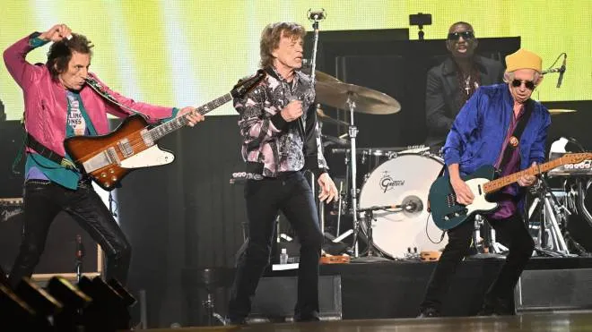 The Rolling Stones' Ronnie Wood (L), Mick Jagger (C), and Keith Richards (R) perform on stage during the band's concert, part of the "Sixty tour", at the Giuseppe Meazza Stadium in MIlan, Italy, 21 June 2022.  The "Sixty tour", first tour after the death of drummer Charlie Watts, celebrates the band's 60th anniversary. ANSA/DANIEL DAL ZENNARO