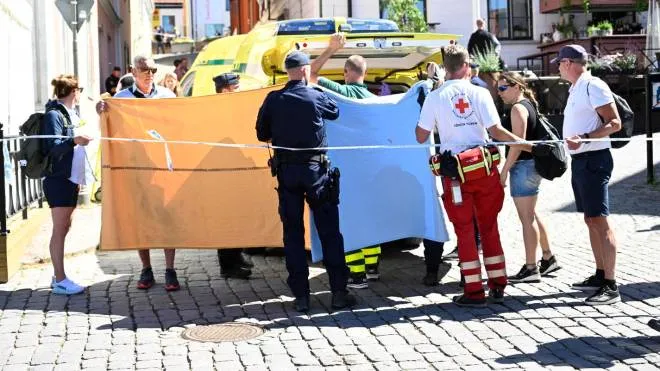 Emergency personnel at the scene where a woman has been seriously injured in a stabbing at the Almedalen political festival on the Swedish island of Gotland, Visby, Sweden, 06 July 2022. A man suspected for the deed has been arrested by the police. ANSA/Henrik Montgomery SWEDEN OUT